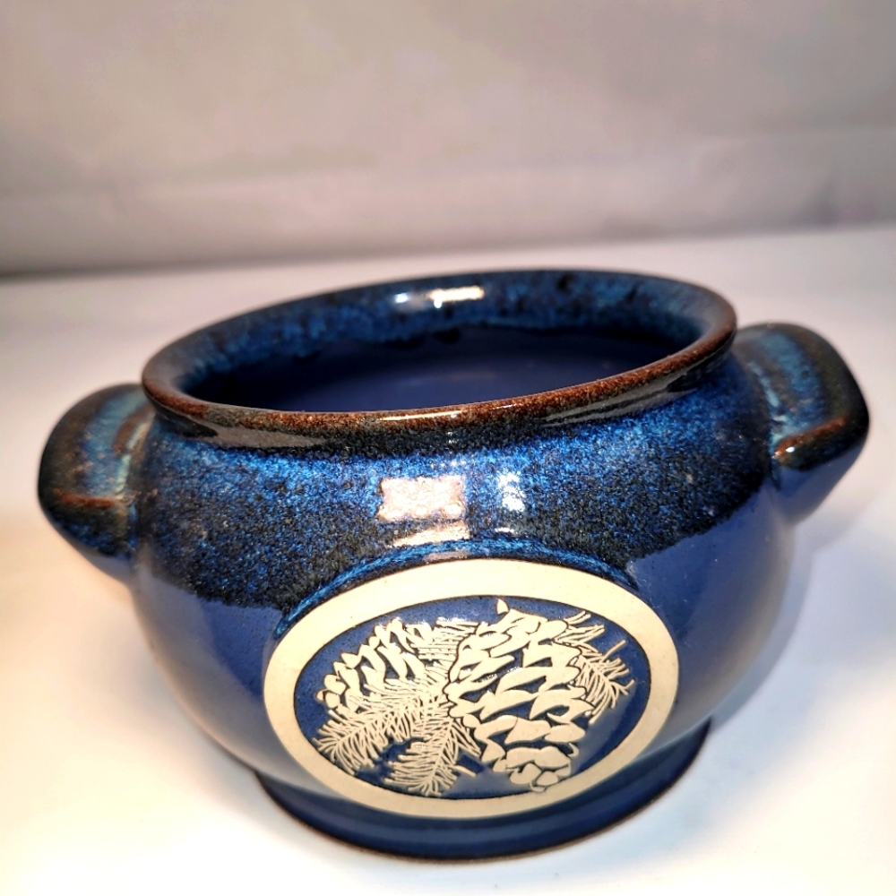 SUNSET HILL STONEWARE Blue Pottery with pine cone/greenery